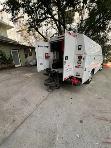 Magnet Plumbing service vehicle on-site for Grease Trap Cleaning in Sixty Point One Ward